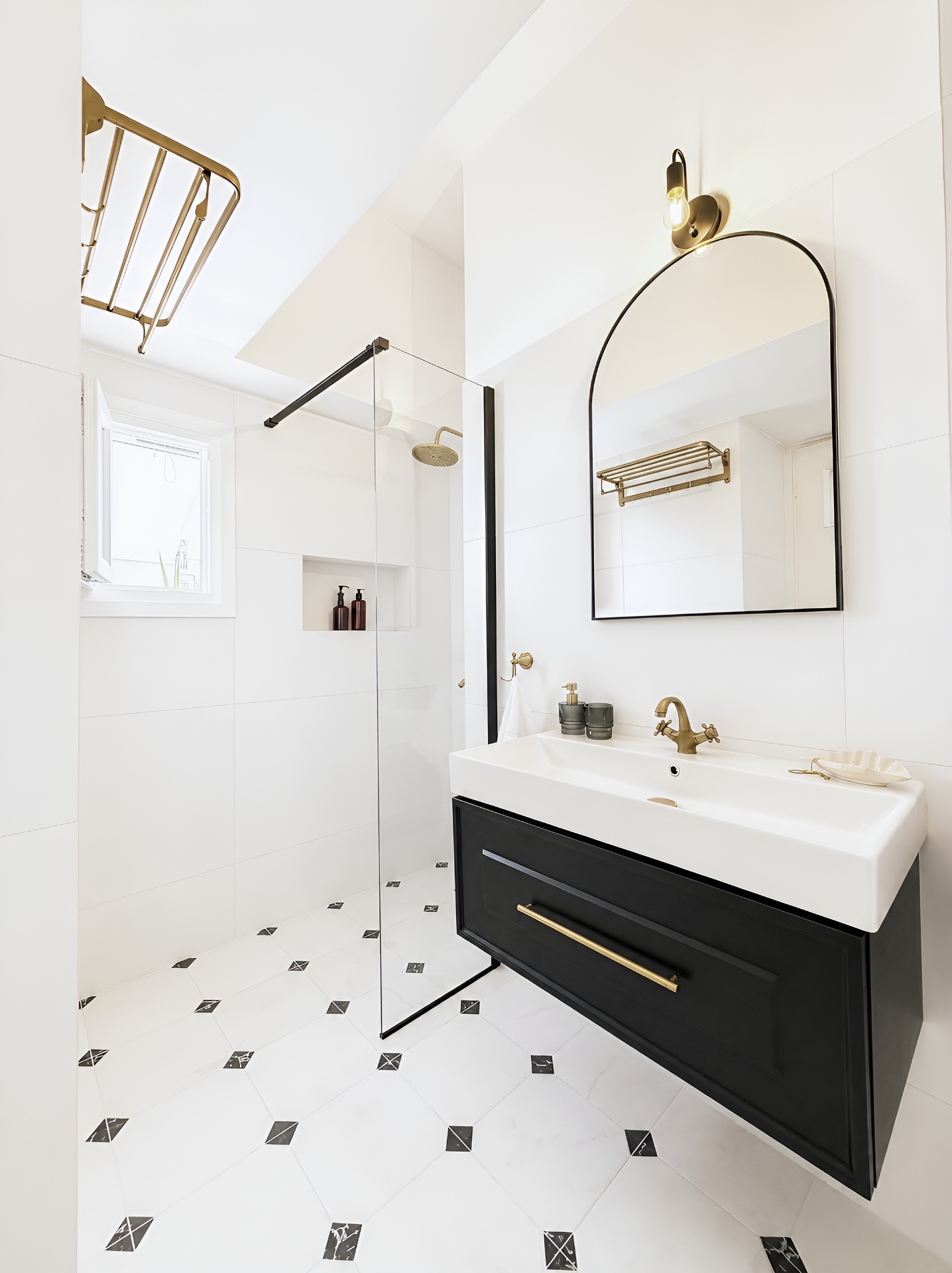 Bathroom with walk-in shower and harlequin marble floor